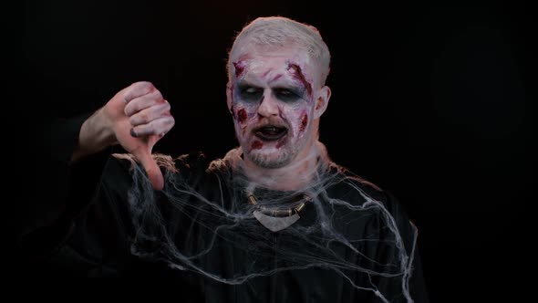 Sinister Man Halloween Zombie Showing Thumbs Down Sign Gesture Disapproval Dissatisfied Dislike