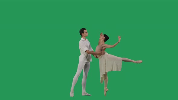 Professional Ballet Pair Practicing Moves on Green Screen