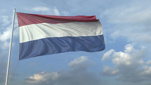 Airliner Flying Over Waving Flag of the Netherlands