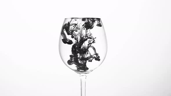 Black Ink Drop in Water - Fast Reverse