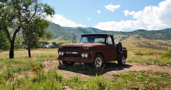 Tilt up of antique GMC pickup truck in the mountains