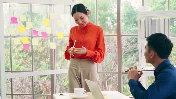 Business People Work on Project Planning Board