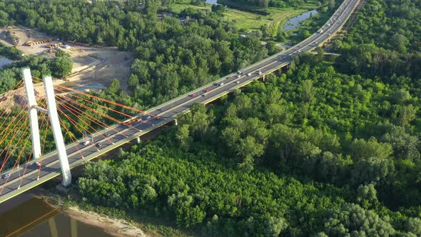 Aerial top down view of traffic jam on a car bridge anding train. 4K video