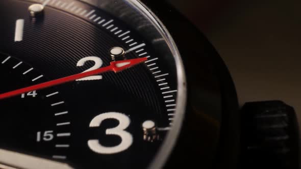 Movement of the clock hand in macro shot