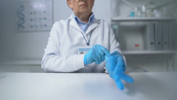 Female Family Therapist Wearing Gloves to Examine Little Patient Healthcare, Pov
