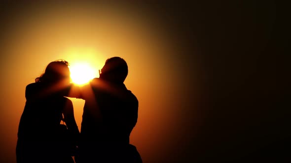 Couple Lovers Silhouette And Sun