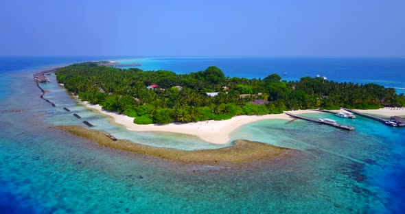 Luxury drone copy space shot of a white sandy paradise beach and blue water background in best quali