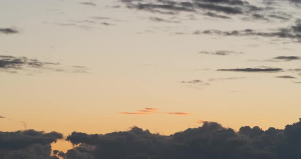 Timelapse of Clouds Forming During Sunset