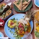 Top View of Assorted Healthy Vegan Options From Global Cuisines. Middle Eastern Meze, Indian Curry - VideoHive Item for Sale