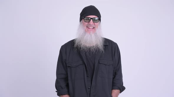 Happy Mature Bearded Hipster Man with Sunglasses Smiling