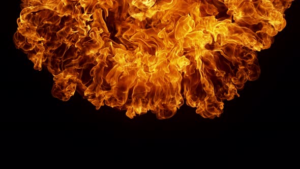 Super Slow Motion Detail Shot of Fire Explosion Against the Black Wall at 1000Fps