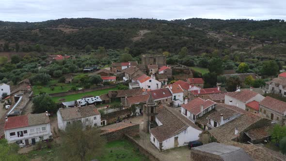 Drone aerial view of Idanha a velha historic village and landscape with Monsanto on the background,