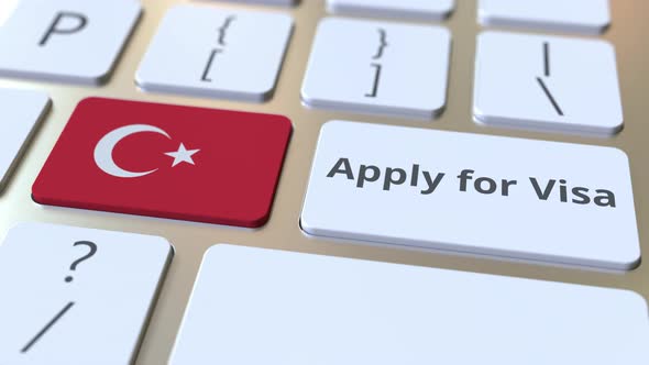 APPLY FOR VISA Text and Flag of Turkey on the Computer Keyboard