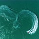 Aerial: Two Water Bikes Jet Ski Are Draw a Heart Shape on the Water on the Sea. - VideoHive Item for Sale
