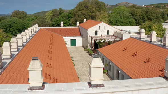 Heritage Hotel Maskovica Han Housed In An Enclosed Walled Compound In Pakostane, Croatia. drone shot