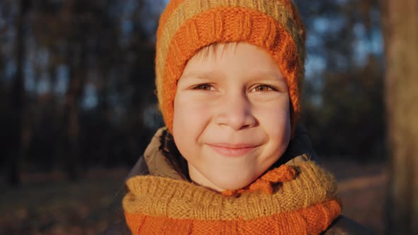 Happy Boy Smiling with His Mouth Without Front Teeth