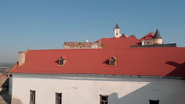 Castle Palanok with Red Roof Under Blue Sky
