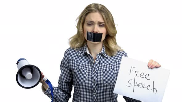Upset Woman with Mouth Taped Shut
