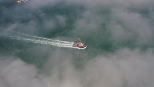 Drone View of the a Tugboat in Motion