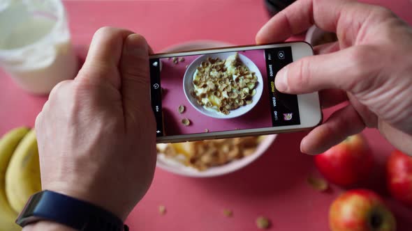 Man Taking Photos of Healthy Breakfast By Phone