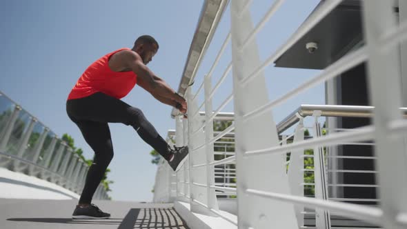 Man exercising in an urban setting