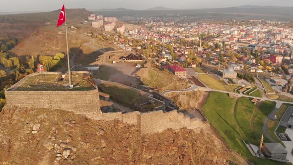 Flying Around of the Turkish Flag Over the Castle of Kars in Turkey