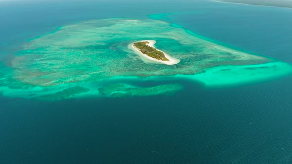 Travel Concept with a Sandy Beach and Blue Sea alt