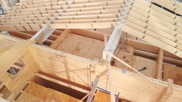 Aerial Shot Wooden Construction of House Roof