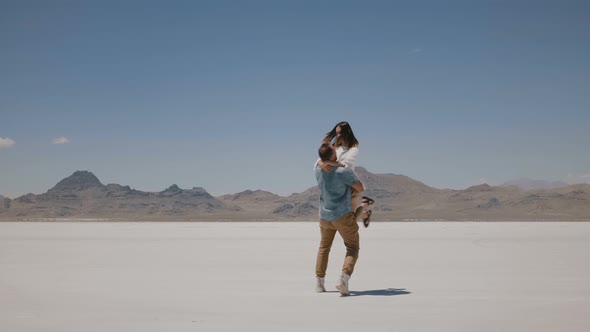 Happy Romantic Couple Enjoy Good Time Together on Vacation, Man Holding Woman in Arms at Sunny Hot