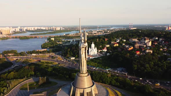 Aerial View of glorious The Motherland Monument located on the banks of Dnieper River