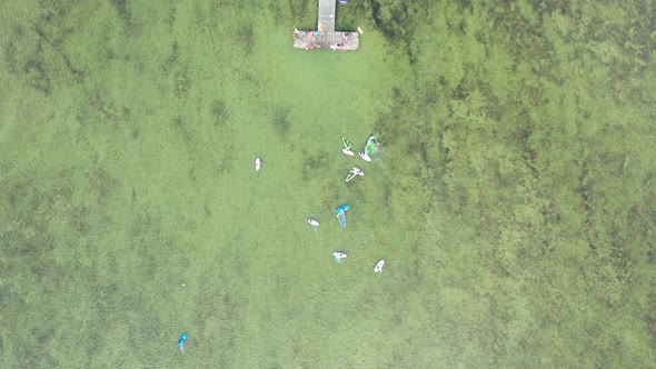 People on windsurfing practicing. Chalupy resort in Poland. Aerial video. Baltic Sea. Aerial View