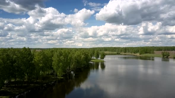 Wide Calm River Reflects Green Trees Silhouettes Upper View