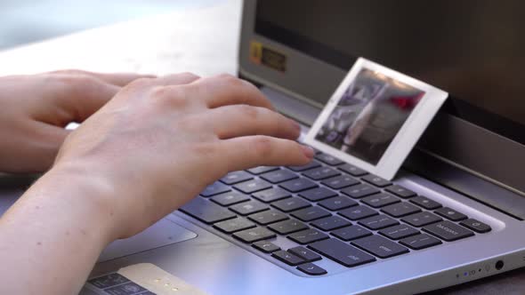 Female Hand Using A Laptop