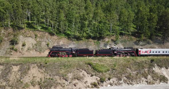 Close Approach Passengers Train Trans Siberian Railway Brick Bridge. Lake Baikal Coast. Summer