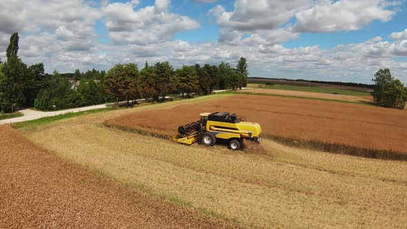 Combine Harvester Harvesting Large Field