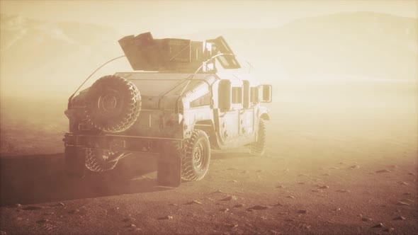 Military Patrol Car on Sunset in Desert Storm alt