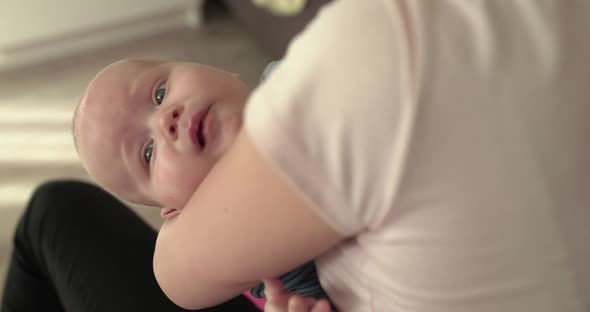 Cute Newborn Crying on Mother's Hands