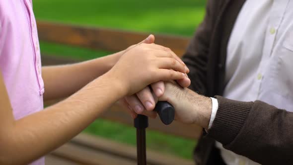 Child Stroking Grandfather Hands, Support of Lonely Person, Social Program