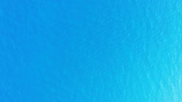 Beautiful drone abstract view of a white sand paradise beach and aqua blue ocean background in best 