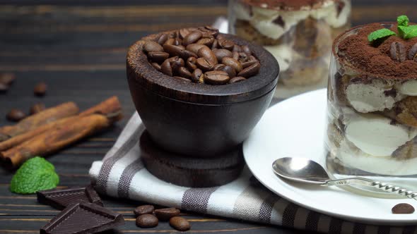 Classic Tiramisu Dessert in a Glass on Wooden Background