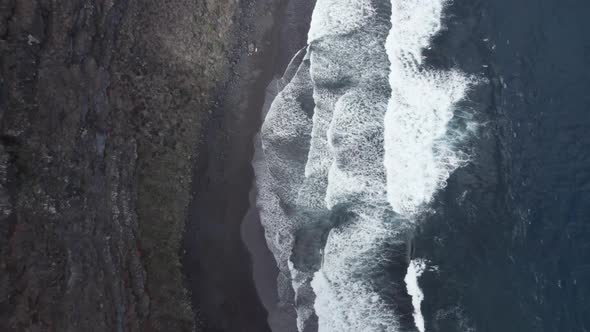 Remote Beach Of Playa Nogales With Black Volcanic Sand And Strong Waves In La Palma, Spain. aerial
