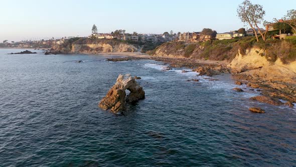 Rotating around million dollar beach front luxury homes and a private beach in beautiful Laguna Beac