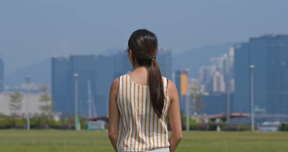 Woman look around the city