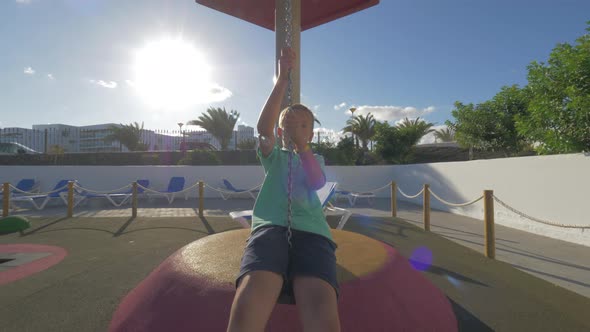 Child on flying fox at the playground