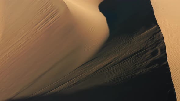  Aerial Drone View Flying By Beautiful Wavy Sand Dunes in Golden Sunset Light