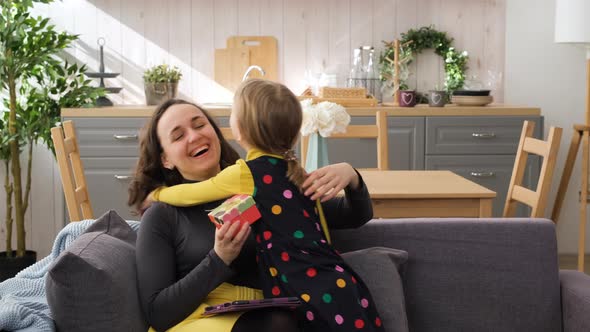 Little Girl Congratulating Her Mom on Mothers Day