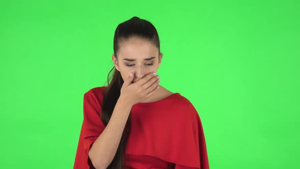 Portrait of Pretty Young Woman Is Getting a Cold, Sore Throat and Head, Cough. Green Screen