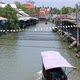 Overview from the Tha Kha Floating Market with a boat passing by - VideoHive Item for Sale