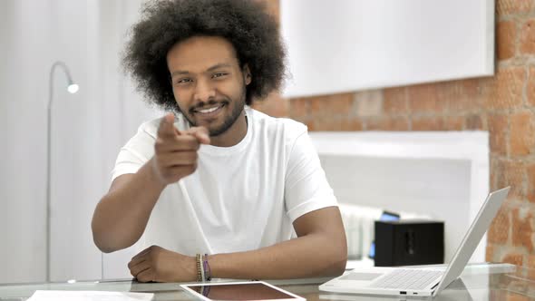 African Man Pointing with Finger