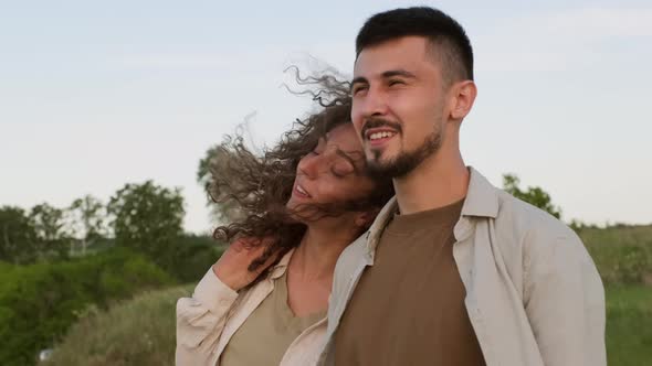 Couple Admiring View Of Landscape